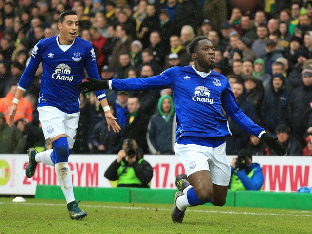 Romelu Lukaku (R) of Everton celebrates scoring his team's first goal with his team mate Ramiro Funes Mori (L) during the Barclays Premier League match between Norwich City and Everton at Carrow Road on December 12, 2015