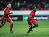 Pione Sisto of FC Midtjylland (R) reacts after scoring against Club Brugge during the UEFA Europa League group D football match between FC Midtjylland vs Club Brugge KV in Herning, Denmark on December 10, 2015