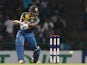 Sri Lankan cricketer Kusal Perera plays a shot during the first Twenty20 International cricket match between Sri Lanka and the West Indies at the Pallekele International Cricket Stadium in Pallekele on November 9, 2015