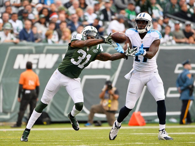 Antonio Cromartie #31 of the New York Jets breaks up a pass inended for Dorial Green-Beckham #17 of the Tennessee Titans in the third quarter during their game at MetLife Stadium on December 13, 2015 