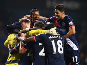 Newcastle United players celebrate victory after the Barclays Premier League match between Tottenham Hotspur and Newcastle United at White Hart Lane on December 13, 2015