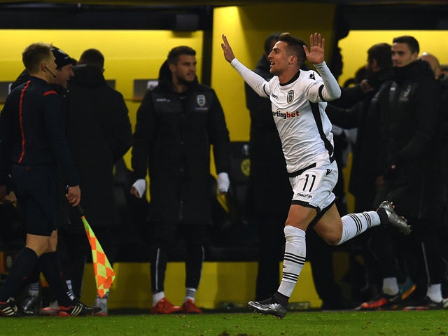 PAOK´s Robert Mak celebrates during the UEFA Europa League football match between Borussia Dortmund and PAOK FC at BVB Stadion Dortmund in Dortmund on December 10, 2015