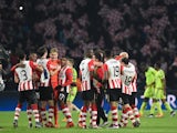 PSV Eindhoven's players celebrate after winning the UEFA Champions League, Group B, football match PSV Eindhoven vs FK CSKA Moscow at the Philips Stadion stadium in Eindhoven on December 8, 2015. PSV won the match 2-1.