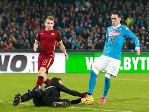 Roma hold off Napoli barrage in draw