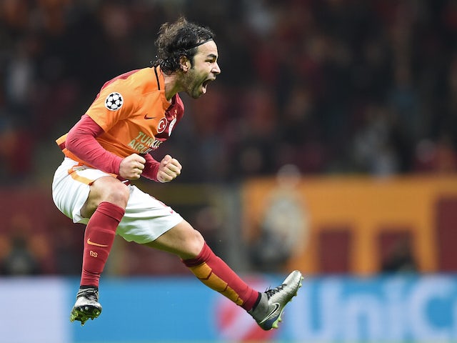Galatasaray's Turkish midfielder and captain Selcuk Inan celebrates after scoring a goal during the UEFA Champions League Group C football match between Galatasaray AS and FC Astana at the Turk Telekom Arena in Istanbul on December 8, 2015. 