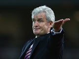 Mark Hughes manager of Stoke City gestures during the Barclays Premier League match between West Ham United and Stoke City at the Boleyn Ground on December 12, 2015