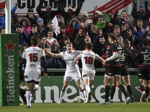 Ulster's Irish wing Andrew Trimble (C) celebrates scoring a try during the European Rugby Champions Cup pool rugby union match between Ulster Rugby and Stade Toulousain at the Kingspan Stadium in Belfast, Northern Ireland, on December 11, 2015