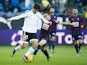 Andres Gomes of Valencia CF duels for the ball with Gonzalo Escalante of SD Eibar during the La Liga match between SD Eibar and Valencia CF at Ipurua Municipal Stadium on December 13, 2015 in Eibar, Spain.