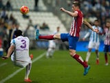Fernando Torres has a shot for Atletico Madrid against Malaga on December 20, 2015