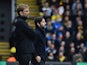 Liverpool manager Jurgen Klopp and his Watford counterpart Quique Flores stand on the touchline on December 20, 2015