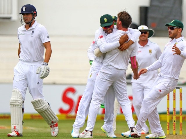 South Africa celebrate after Dale Steyn took the wicket of England captain Alastair Cook on day one of the first Test in Durban on December 26, 2015