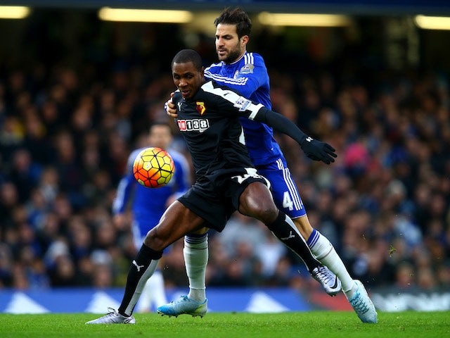 Chelsea's Cesc Fabregas battles with Odion Ighalo of Watford on December 26, 2015