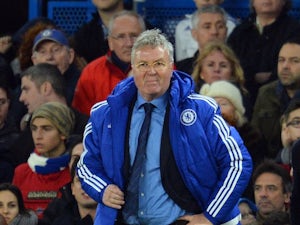 Chelsea boss Guus Hiddink strikes a pose in the dugout during the game with Watford on December 26, 2015