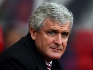 Mark Hughes "pleased" with Arsenal draw