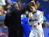 Mesut Ozil and Jose Mourinho pictured together while at Real Madrid in 2012