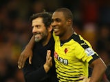 Watford manager Quique Sanchez Flores hugs Odion Ighalo after the 3-0 win over Liverpool on December 20, 2015