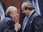 Sepp Blatter and Michel Platini gleefully shake hands in Zurich on May 29, 2015