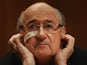 Outgoing FIFA president Sepp Blatter at a press conference after he was banned from all football activity for eight years on December 21, 2015