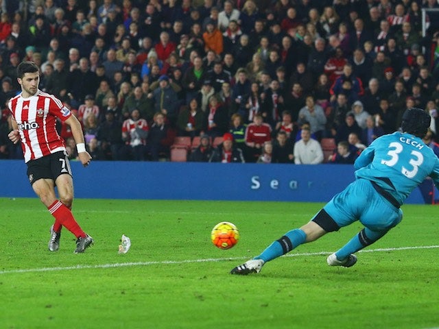 Shane Long scores Southampton's second goal past Arsenal keeper Petr Cech on December 26, 2015