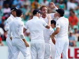 Stuart Broad celebrates with England teammates on day two of the first Test with South Africa on December 27, 2015