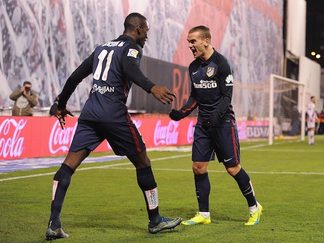 Antoine Greizmann and Jackson Martinez celebrate during the game between Rayo Vallecano and Atletico Madrid on December 30, 2015