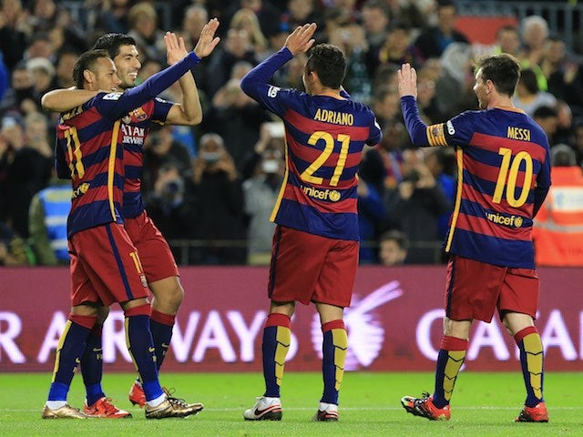 Barca players celebrate during the game between Barcelona and Real Betis on December 30, 2015)