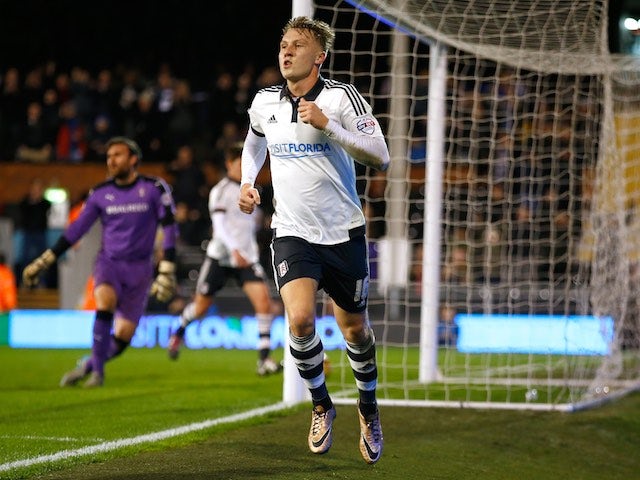 Little Cauley Woodrow celebrates scoring a second for Fulham against Rotherham on December 29, 2015