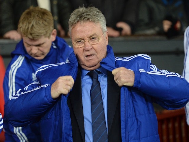 Guus Hiddink wraps up warm during the game between Manchester United and Chelsea on December 28, 2015