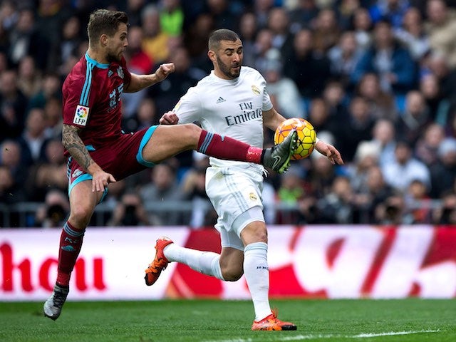 Inigo Martinez and Karim Benzema in action during the game between Real Madrid and Real Sociedad on December 30, 2015