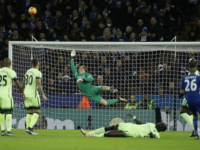 Joe Hart dives to save a Riyad Mahrez shot during the game between Leicester City and Manchester City on December 29, 2015