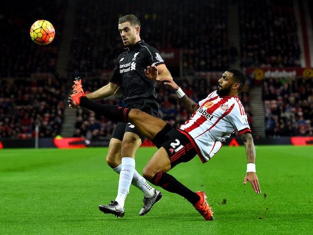 Jordan Henderson and Yann M'Vila in action during the game between Sunderland and Liverpool on December 30, 2015