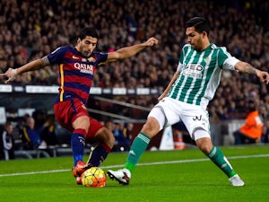 Luis Suarez and Juan Vargas in action during the game between Barcelona and Real Betis on December 30, 2015