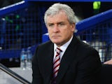Stoke City boss Mark Hughes watches on during the game with Everton on December 28, 2015