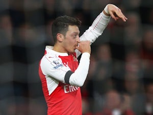 Mesut Ozil eases injury concerns