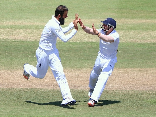 England bowler Moeen Ali celebrates a wicket on day five of the first Test against South Africa in Durban on December 30, 2015