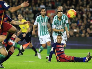 Neymar takes a seat during the game between Barcelona and Real Betis on December 30, 2015