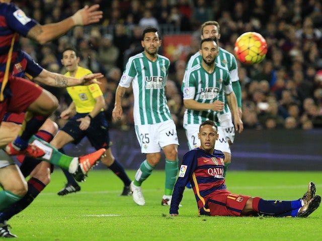Neymar takes a seat during the game between Barcelona and Real Betis on December 30, 2015