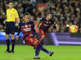 Neymar kicks a penalty during the game between Barcelona and Real Betis on December 30, 2015
