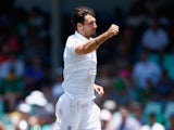A celebratory Steven Finn in action on day three of the first Test between South Africa and England on December 28, 2015