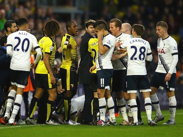 Watford and Spurs players argue after Miguel Britos takes down Kieran Trippier on December 28, 2015