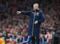 Arsene Wenger and his oversized coat in action during the FA Cup game between Arsenal and Sunderland on January 9, 2016