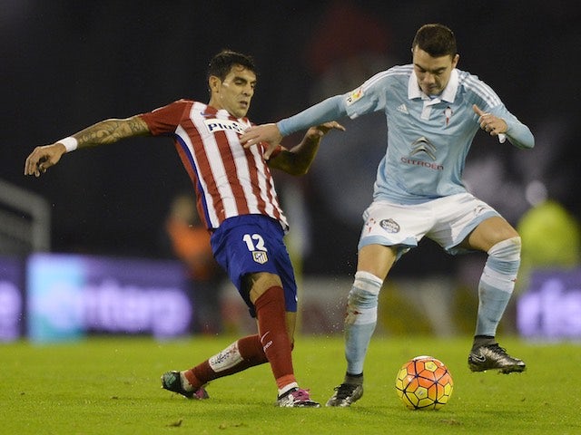 Augusto Fernandez and Iago Aspas in action during the game between Celta Vigo and Atletico Madrid on January 10, 2016