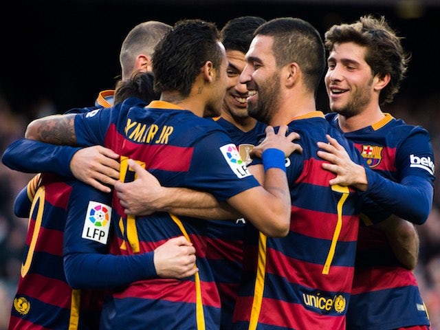 Barcelona players celebrate during the game with Granada on January 9, 2016