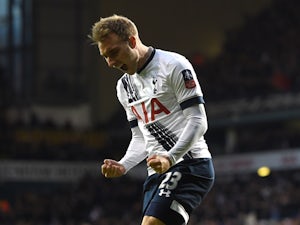 Christian Eriksen celebrates after scoring the opening goal during the FA Cup third-round match between Tottenham Hotspur and Leicester City at White Hart Lane on January 10, 2016