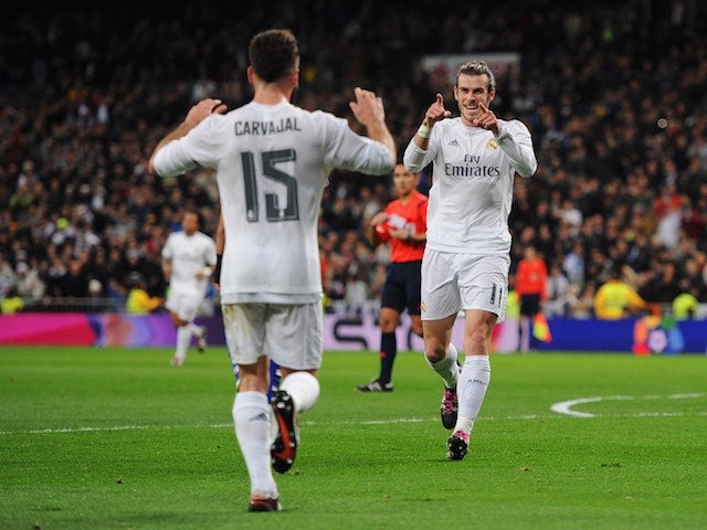 Gareth Bale celebrates with Daniel Carvajal during the game between Real Madrid and Deportivo La Coruna on January 9, 2016