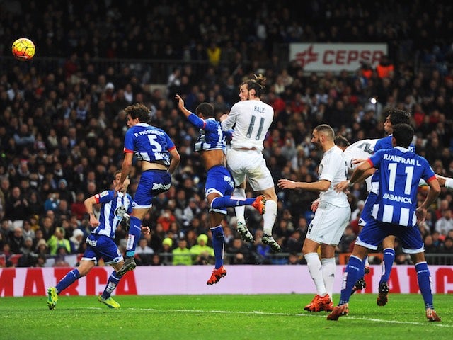 Gareth Bale scores with his head to complete his hat-trick during the game between Real Madrid and Deportivo La Coruna on January 9, 2016
