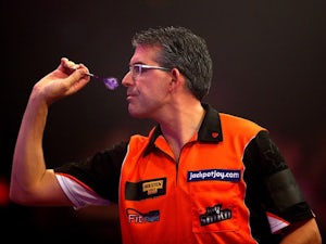 Greaves, Sherrock bow out of Grand Slam of Darts