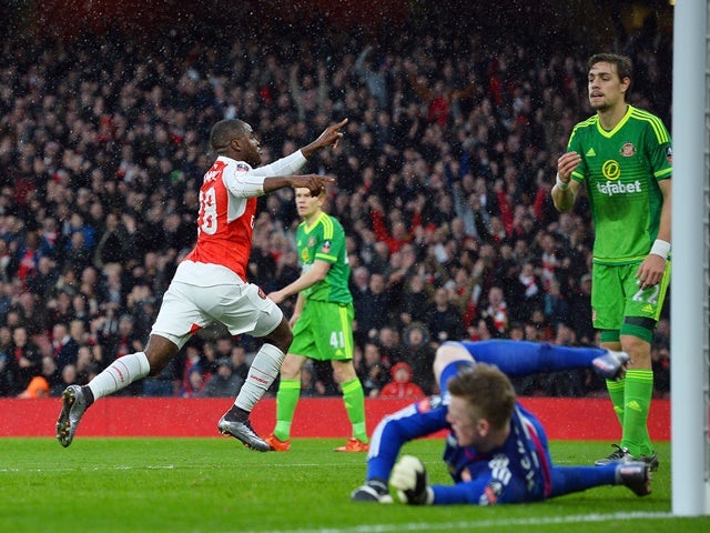 Arsenal's Joel Campbell celebrates scoring their first goal during the FA Cup third-round match against Sunderland on January 9, 2016