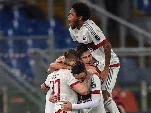 Juraj Kucka celebrates with an orgasmic teammate during the game between Roma and AC Milan on January 9, 2016
