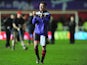 Lee Holmes of Exeter City applauds the crowd as they draw with Liverpool at St James Park in the FA Cup third round on January 8, 2016